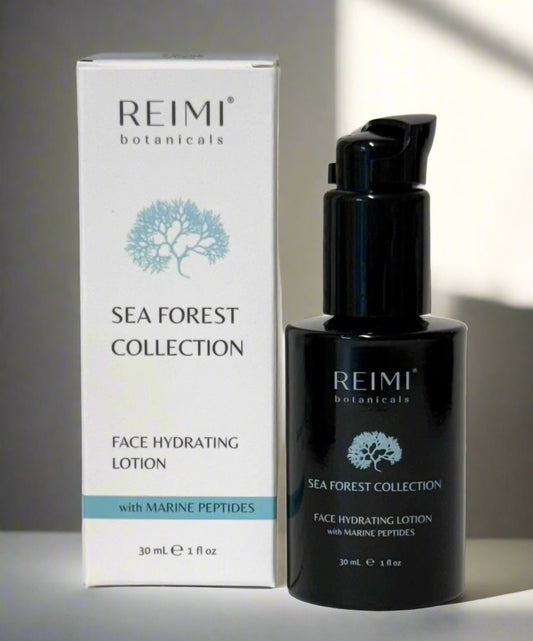 Sea Forest Collection Hydrating Lotion in black bottle with blue letters and logo next to white box with blue and black ink