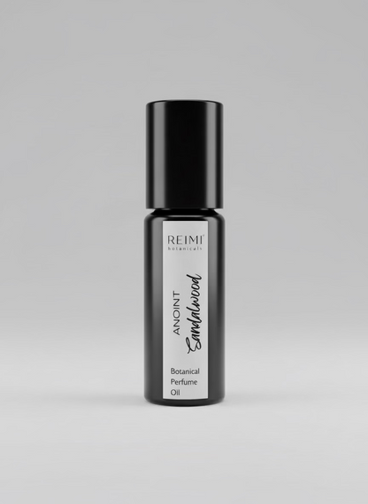 Perfume bottle labeled 'REINI' on a gray background