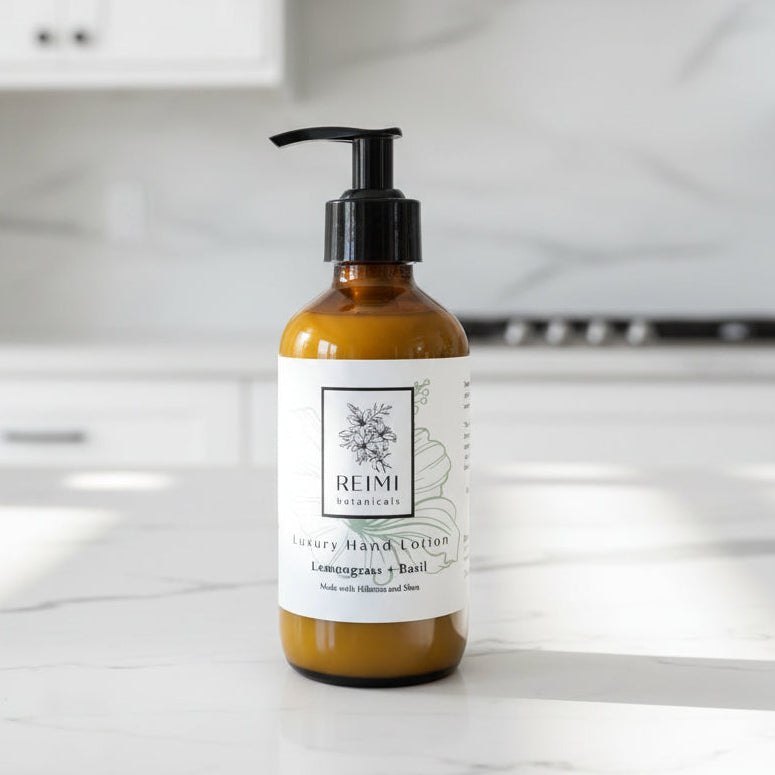 brown glass bottle of REIMI lotion on a white countertop and background