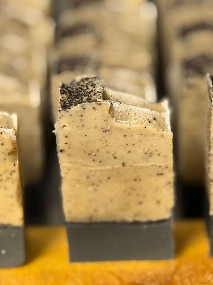 Close-up of layered soap bars with a focus on texture and color.