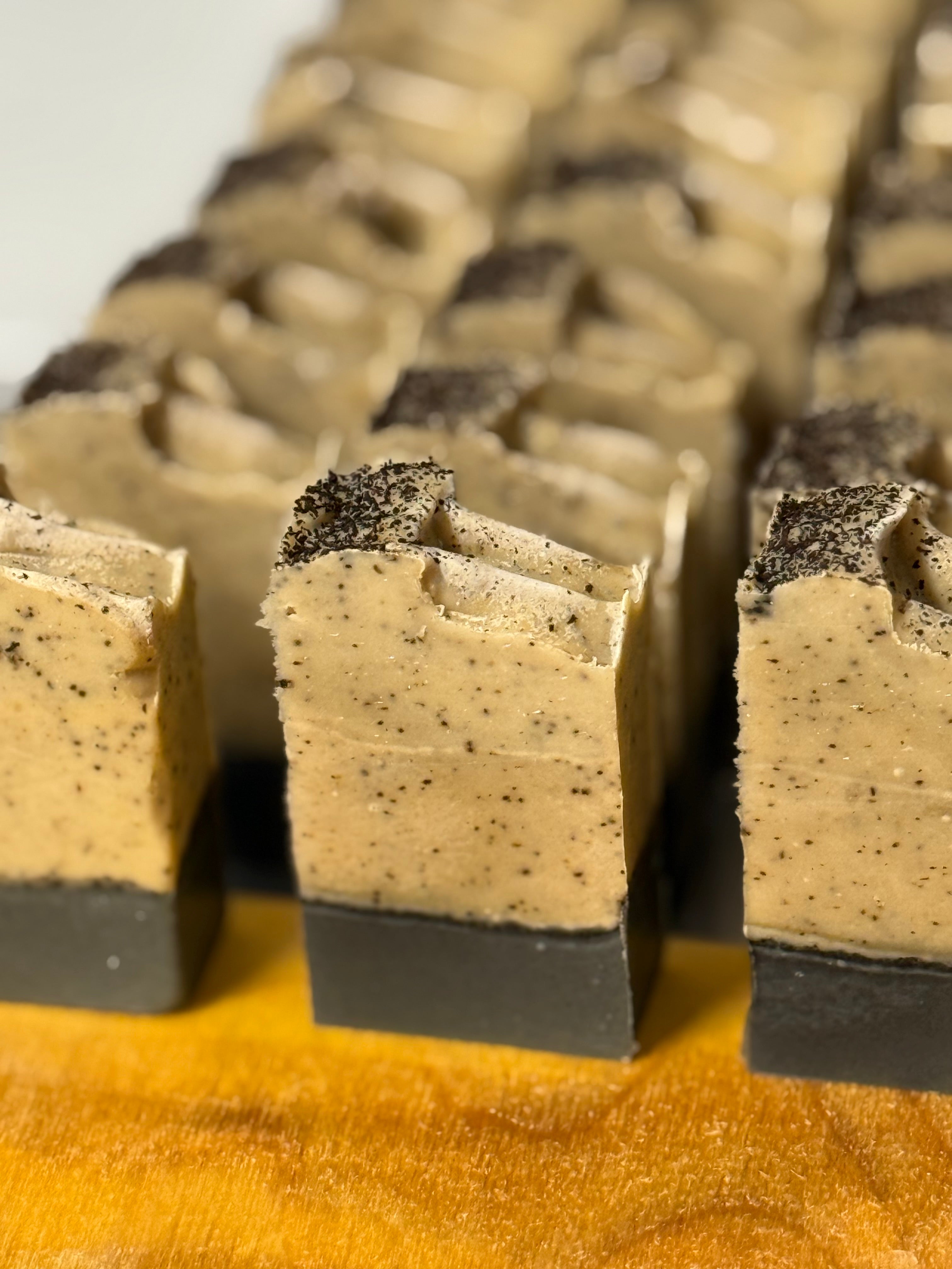 Rectangular slices of soap bars on a wooden board