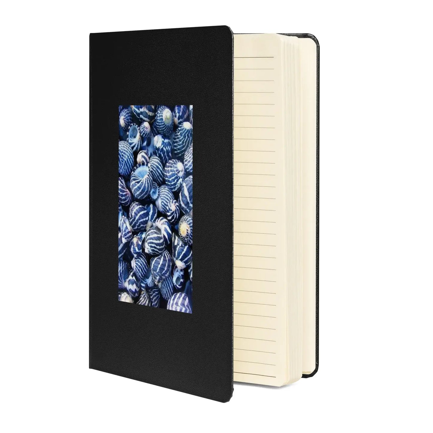 Black notebook with a screen displaying blue and white patterns on a white background