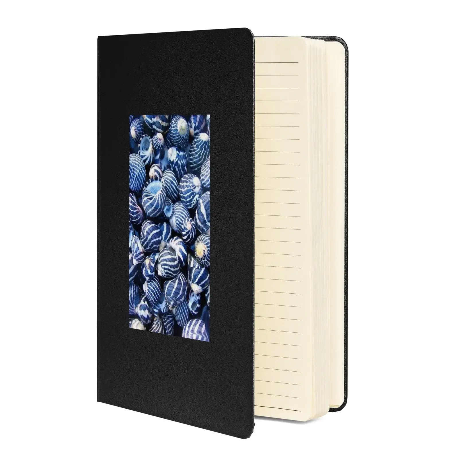 Black notebook with a screen displaying blue and white patterns on a white background